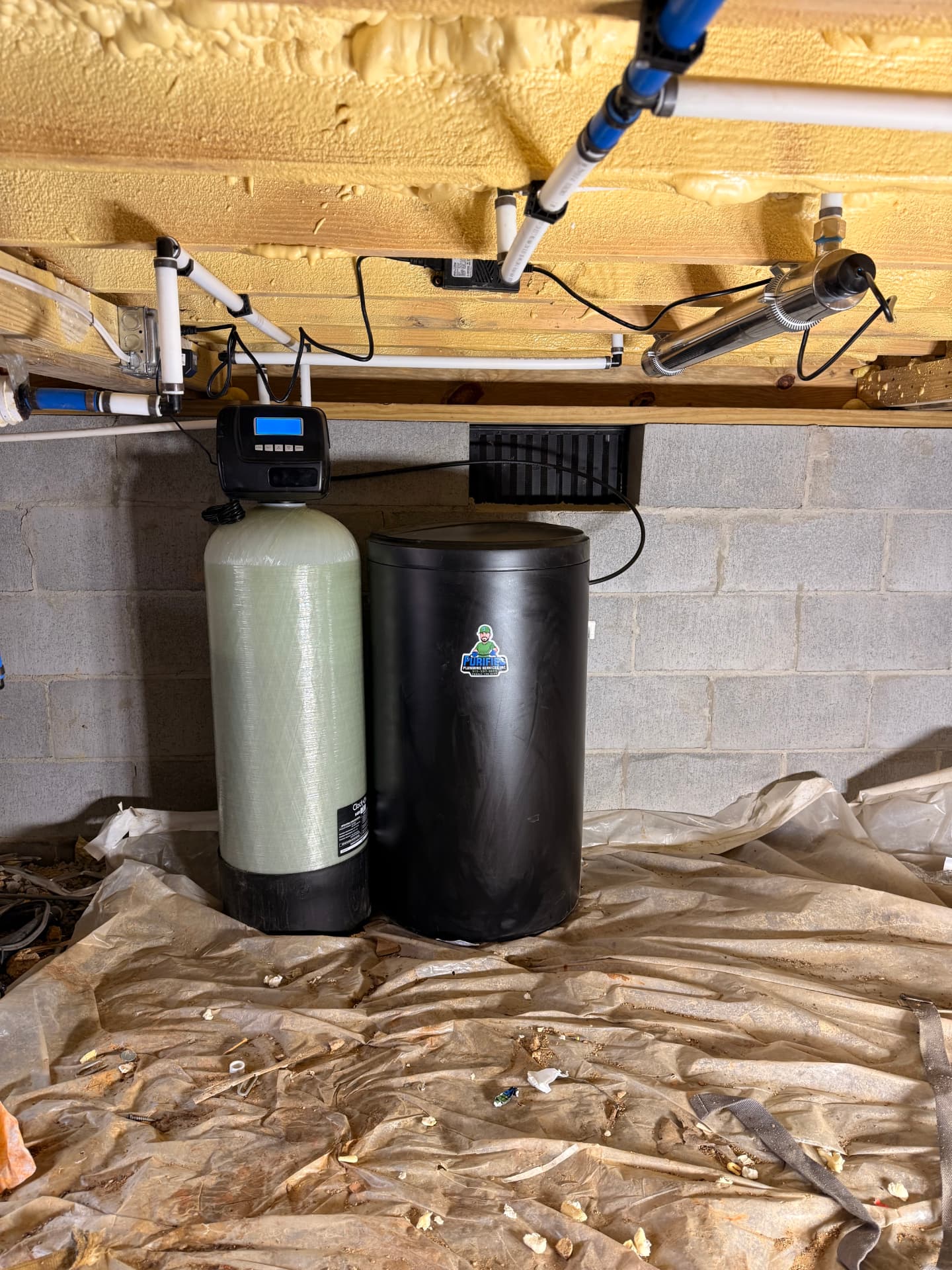 Water softener and UV sterilizer installed in a crawlspace
