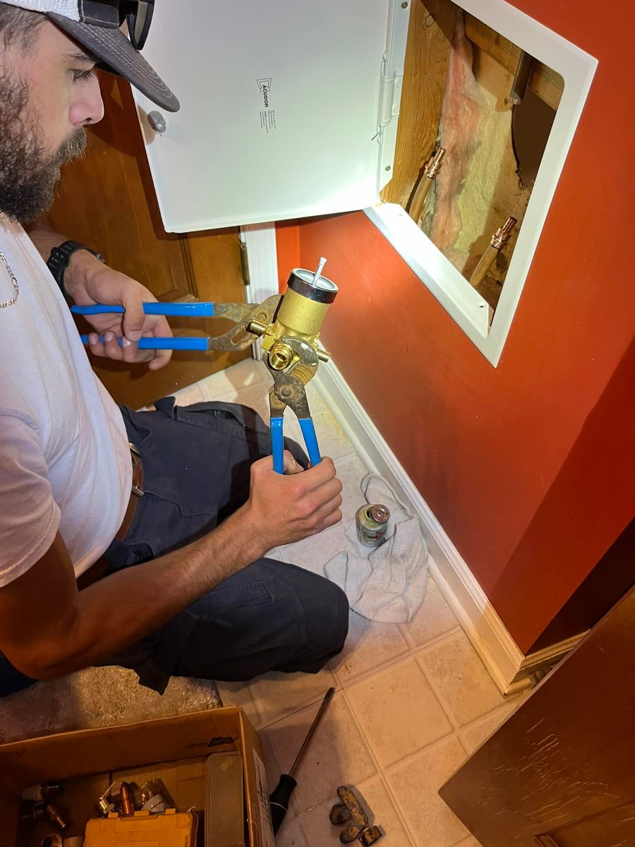 Purified Plumbing Services plumber at work