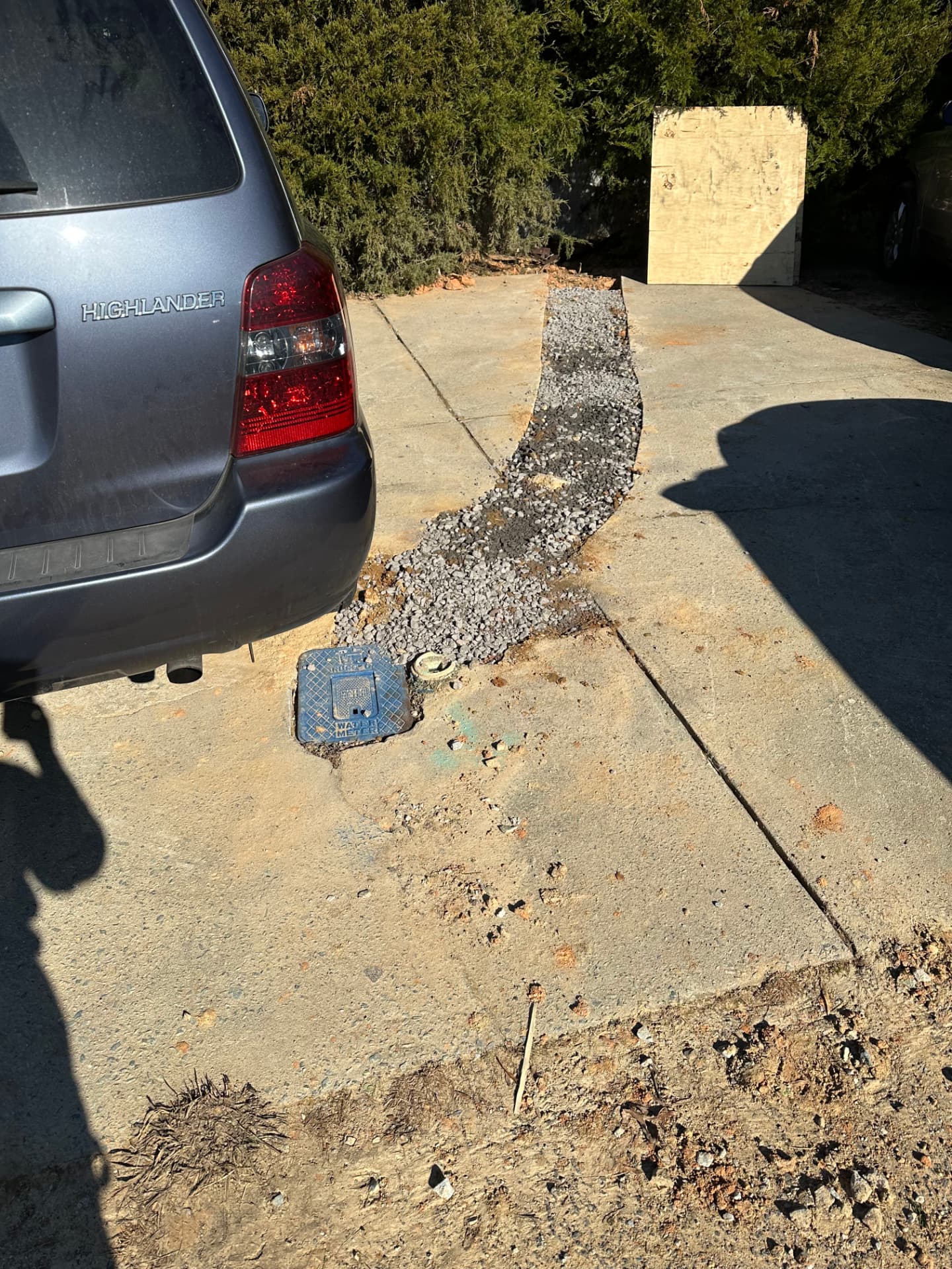 Water service patched back into the driveway