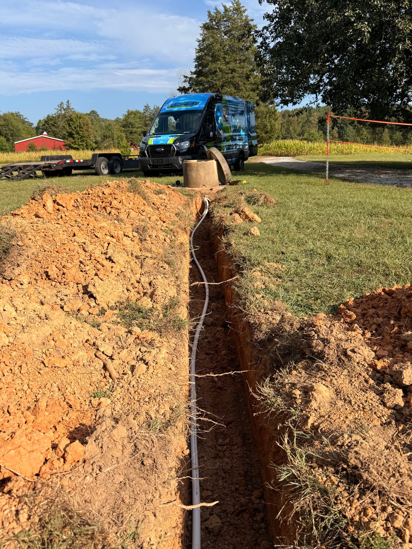 New water service line in a field trench