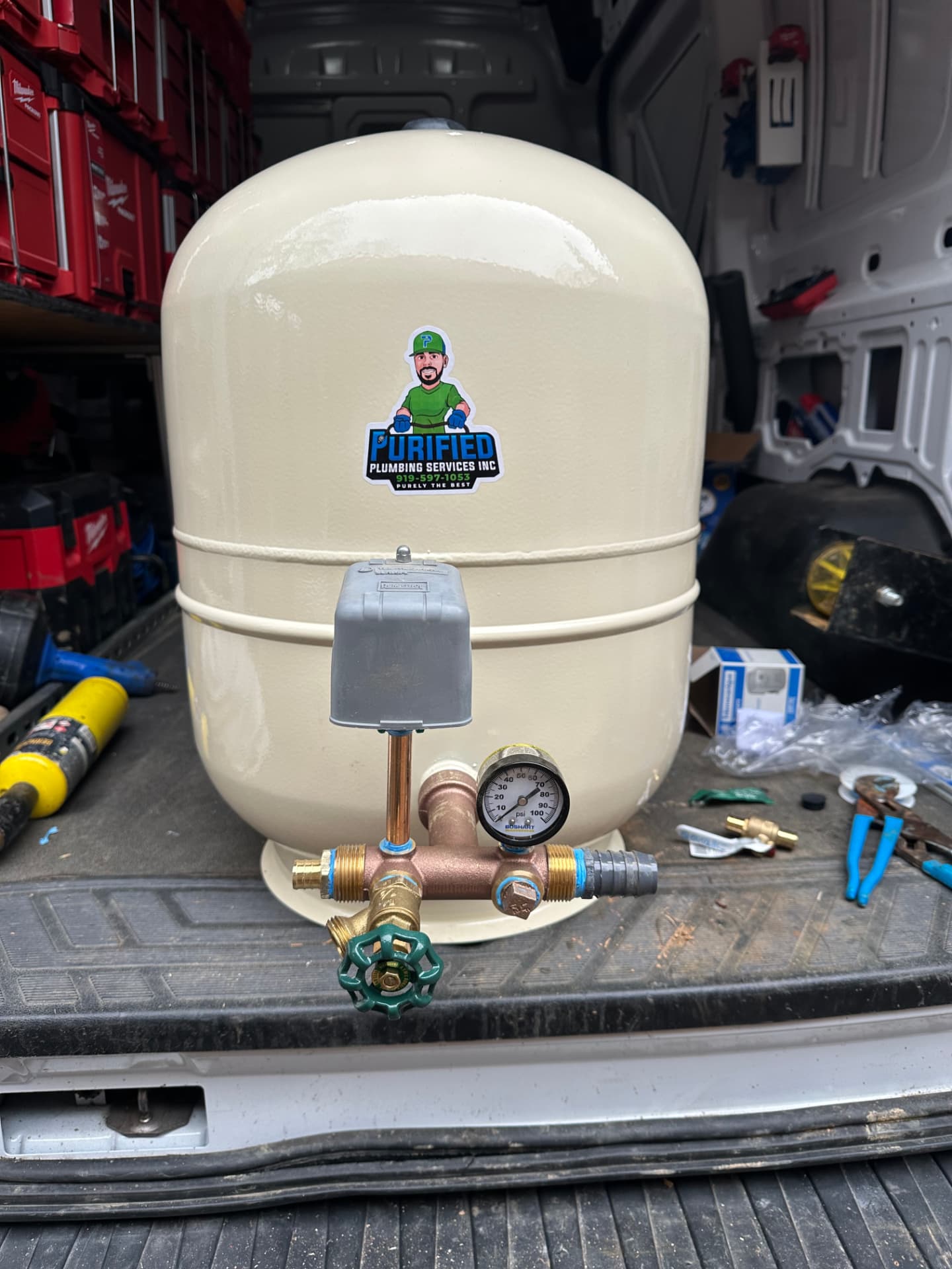 Pressure tank tee assembly with gauge and shutoff prepped in the van